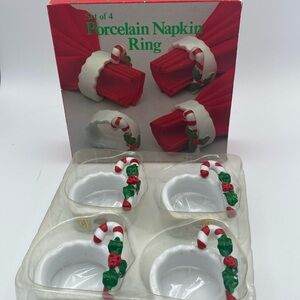 Set of 4 Porcelain Christmas candy cane napkin rings NOS
